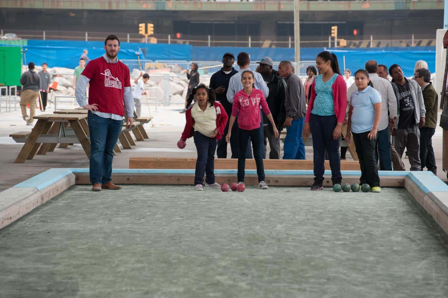 Children playing bocce at Pier 2.